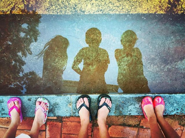 May 23 kids-reflection-puddle_90161_990x742